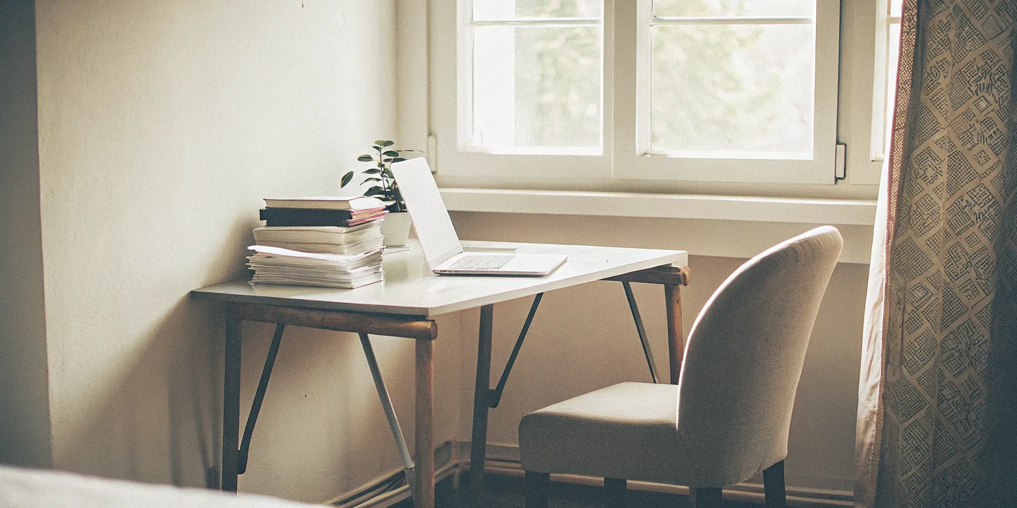 Home care agency owner organizing documents for loan requirements.